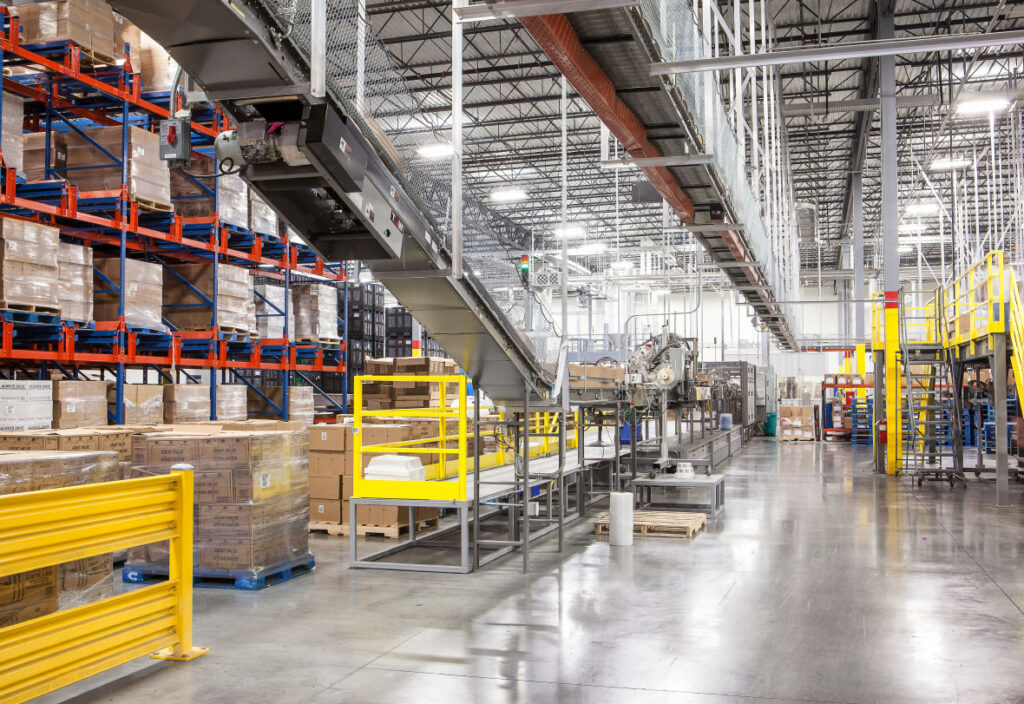 ARCO-Distribution-Premium-Waters-Process Conveyor system & racking inside the of an FDA-certified Premium Waters Water processing Facility