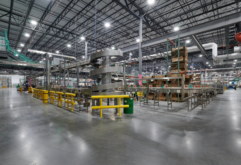 Conveyor system and racking inside the Arizona Beverages Processing facility located in Woodbridge, NJ